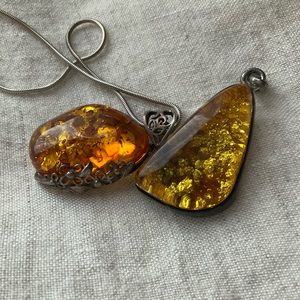 Amber and silver pendants with one silver chain